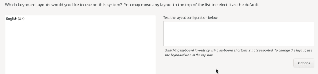 The partial image shows the options on the Keyboard Layout screen. The leftmost pane is an area that contains the default keyboard layout, English (US). Control buttons at the bottom of the pane enable you to add and remove keyboard layouts and rearrange their order on the list. On the right side of the pane is a text box for testing the keyboard layouts. Underneath this text box is a warning that keyboard layout switching by using keyboard shortcuts isn't possible, and underneath is an Options button for configuring layout switching.