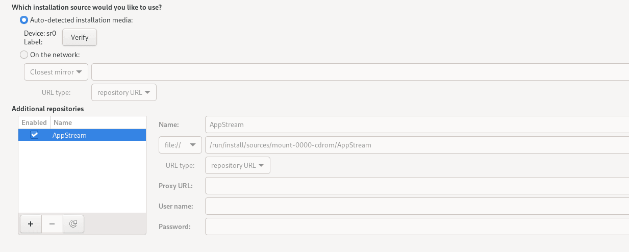 The image shows the Installation Source screen, which contains two options for selecting the installation source: Auto detected Installation Media and On the Network. Beside the auto detected installation media option is a Verify button. The On the Network option includes a drop-down list of network protocols, a text box to specify network location, and a drop-down list of URL types. Underneath the URL type dropdown list is a text box for adding more repositories. The text box automatically lists available repositories but can also include other repositories you might want to add through buttons for adding, removing, and reloading repositories. These buttons are at the bottom of the text box. To the right side of the text box are fields for name, location, proxy details, and user data. These fields provide information about a selected repository in the text box. This specific image applies to a case where the full ISO image is the installation source. The image shows the Installation Source screen, which contains two options for selecting the installation source: Auto detected Installation Media and On the Network. Beside the auto detected installation media option is a Verify button. The On the Network option includes a drop-down list of network protocols, a text box to specify network location, and a drop-down list of URL types. Underneath the URL type dropdown list is a text box for adding more repositories. The text box automatically lists available repositories but can also include other repositories you might want to add through buttons for adding, removing, and reloading repositories. These buttons are at the bottom of the text box. To the right side of the text box are fields for name, location, proxy details, and user data. These fields provide information about a selected repository in the text box. This specific image applies to a case where the full ISO image is the installation source.